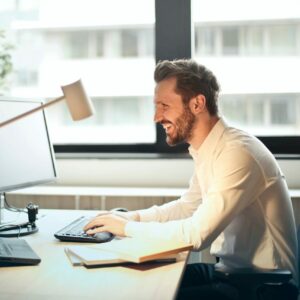 smiling man working in the office